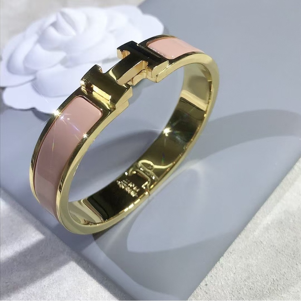 Hermes Pink And Gold Clic H Bracelet